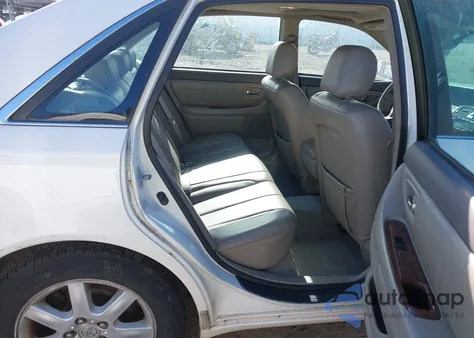 2000 Toyota Avalon Xls z USA, uszkodzony, nr VIN 4T1BF28B0YU020175